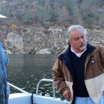 The San Joaquin Valley’s newest State Senator, Andy Vidak (left) sees the site of the proposed 1.2 million acre-foot Temperance Flat Reservoir’s dam in the upper end of Millerton Lake. Vidak (R-HANFORD) listens as Friant Water Authority Assistant General Manager Mario Santoyo explains how the reservoir, development of which could benefit from a state water bond as it now stands, would operate.