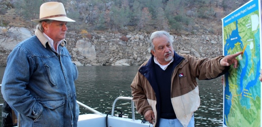 The San Joaquin Valley’s newest State Senator, Andy Vidak (left) sees the site of the proposed 1.2 million acre-foot Temperance Flat Reservoir’s dam in the upper end of Millerton Lake. Vidak (R-HANFORD) listens as Friant Water Authority Assistant General Manager Mario Santoyo explains how the reservoir, development of which could benefit from a state water bond as it now stands, would operate.