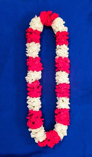 Pink and white Lei for Hawaiian-themed wedding