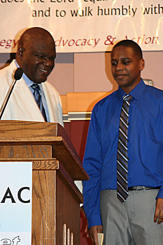 parishioner,gallantry rev rick tyson and parishioner
