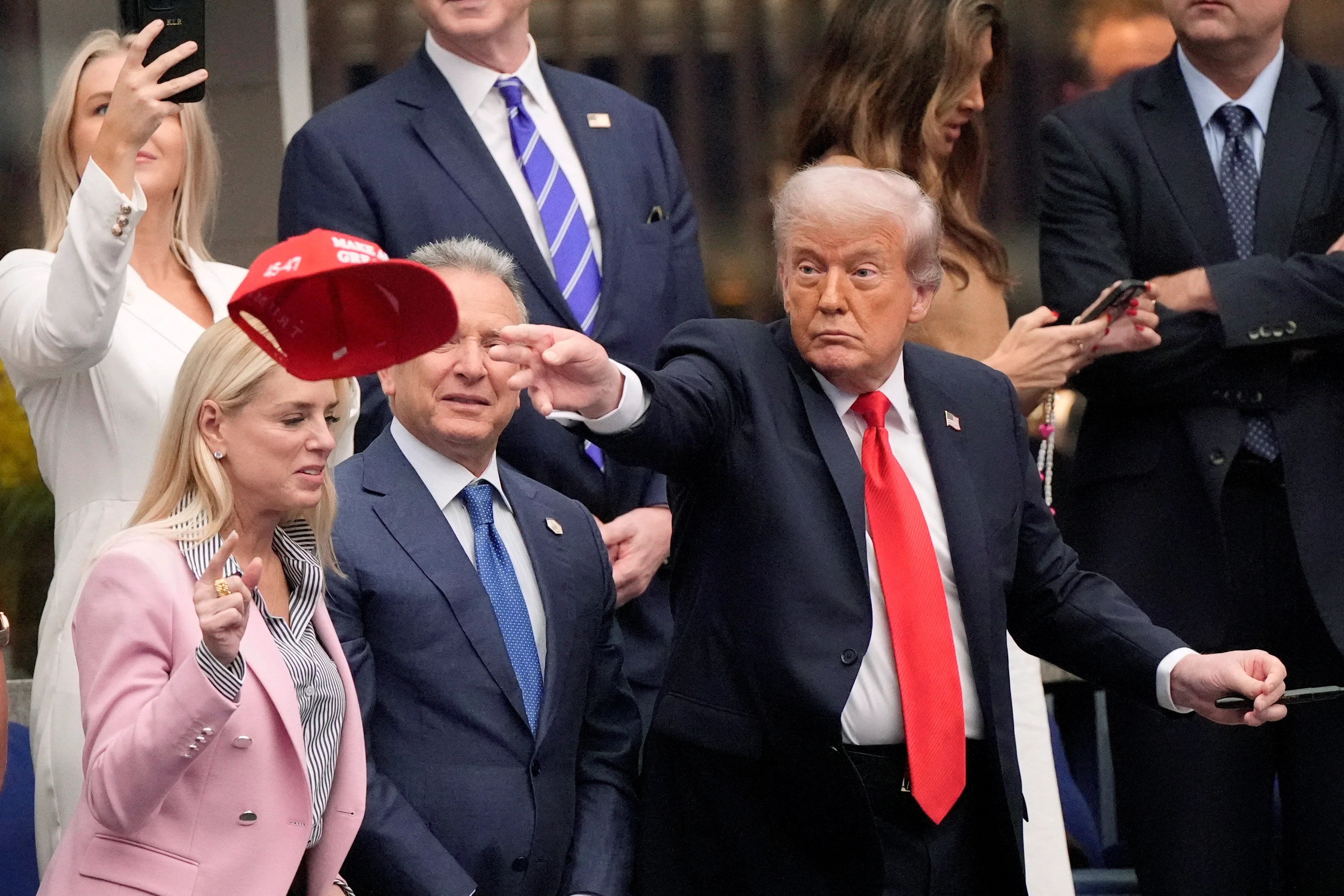 Trump seen with mysterious blue object in his mouth at US Open Trump seen with mysterious blue object in his mouth at US Open