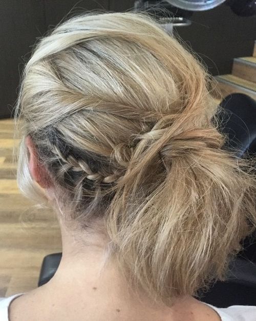 messy side pony with braids and twists