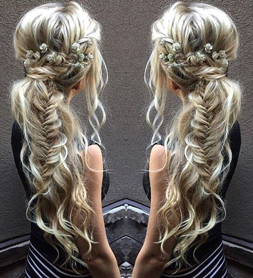 messy boho ponytail with fishtail braid