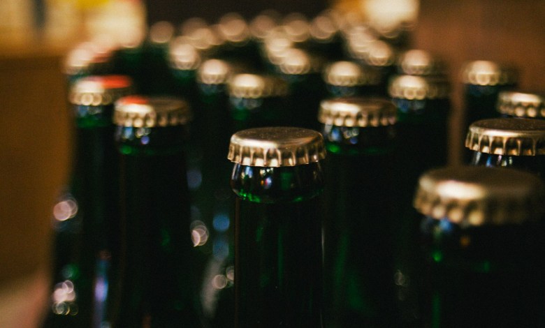 close-up photo of bottles with lids