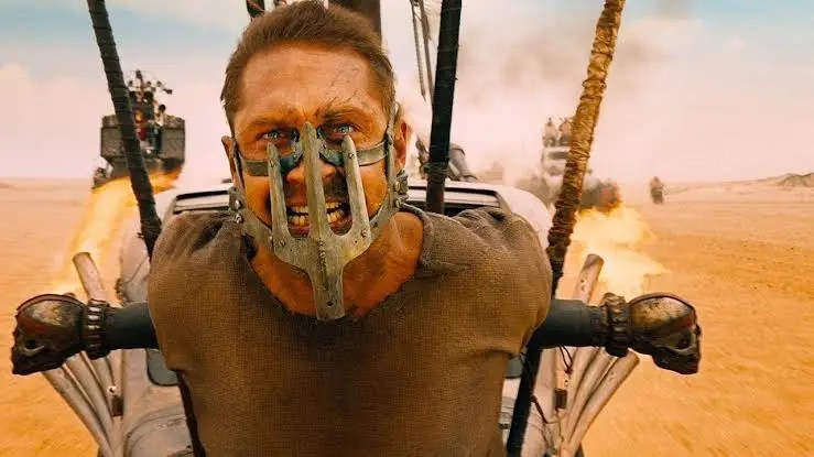 Mad Max: Fury Road shows Max caged and haunted within the first few frames.