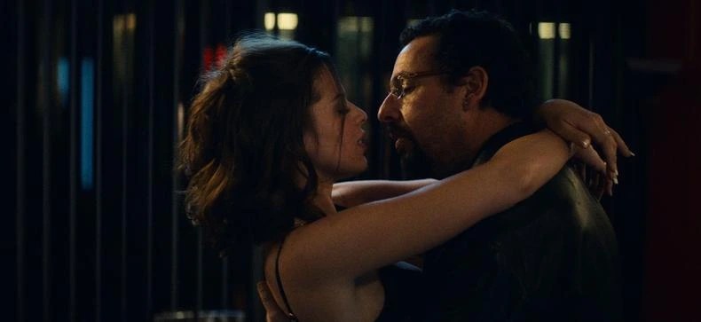 Actors rehearsing a choreographed intimate scene on a closed film set