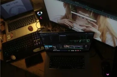 A laptop screen displaying film scheduling software with scene breakdowns
