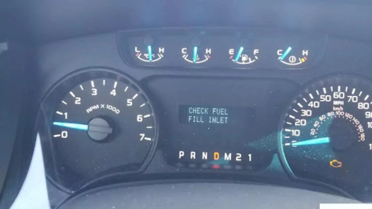 Check Fuel Fill Inlet Warning Light