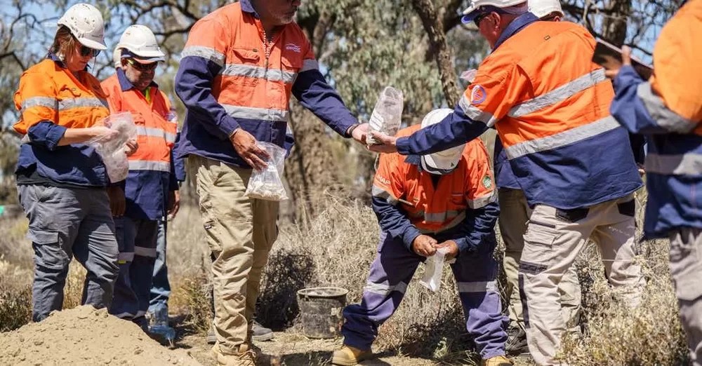 Returning the shell middens to country
