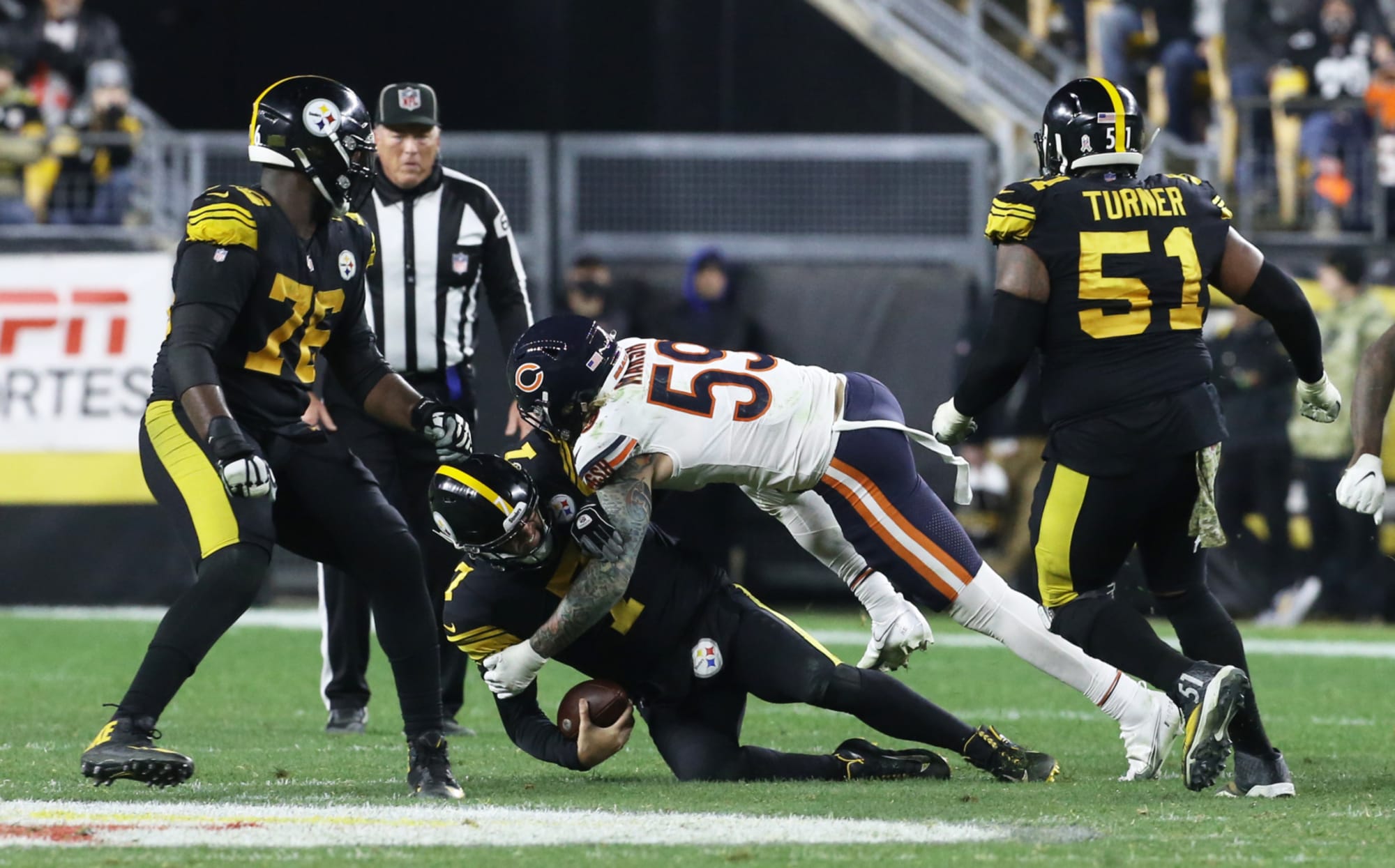 NFL fines Cassius Marsh over Tony Corrente...