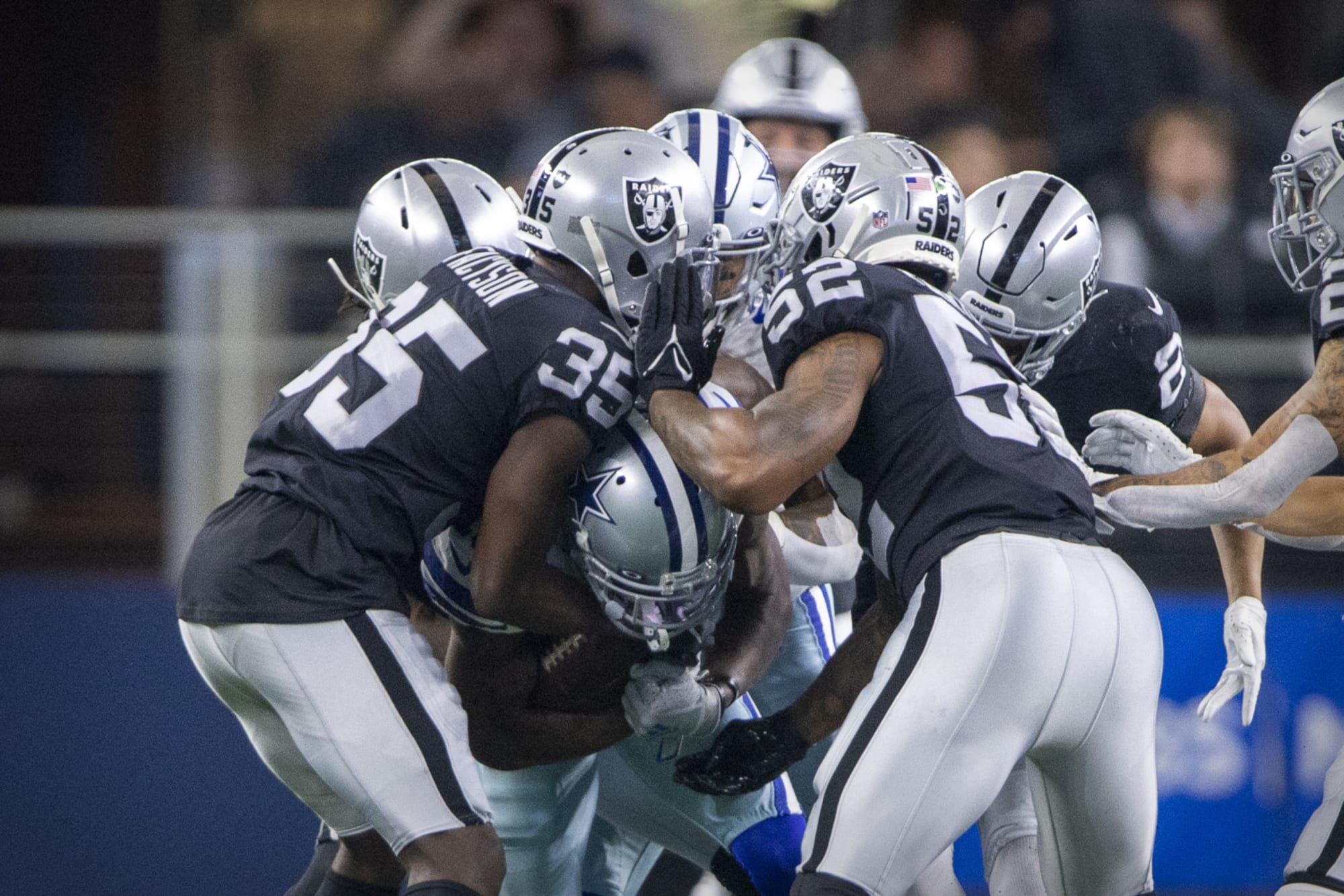Watch Cowboys and Raiders throw punches in...