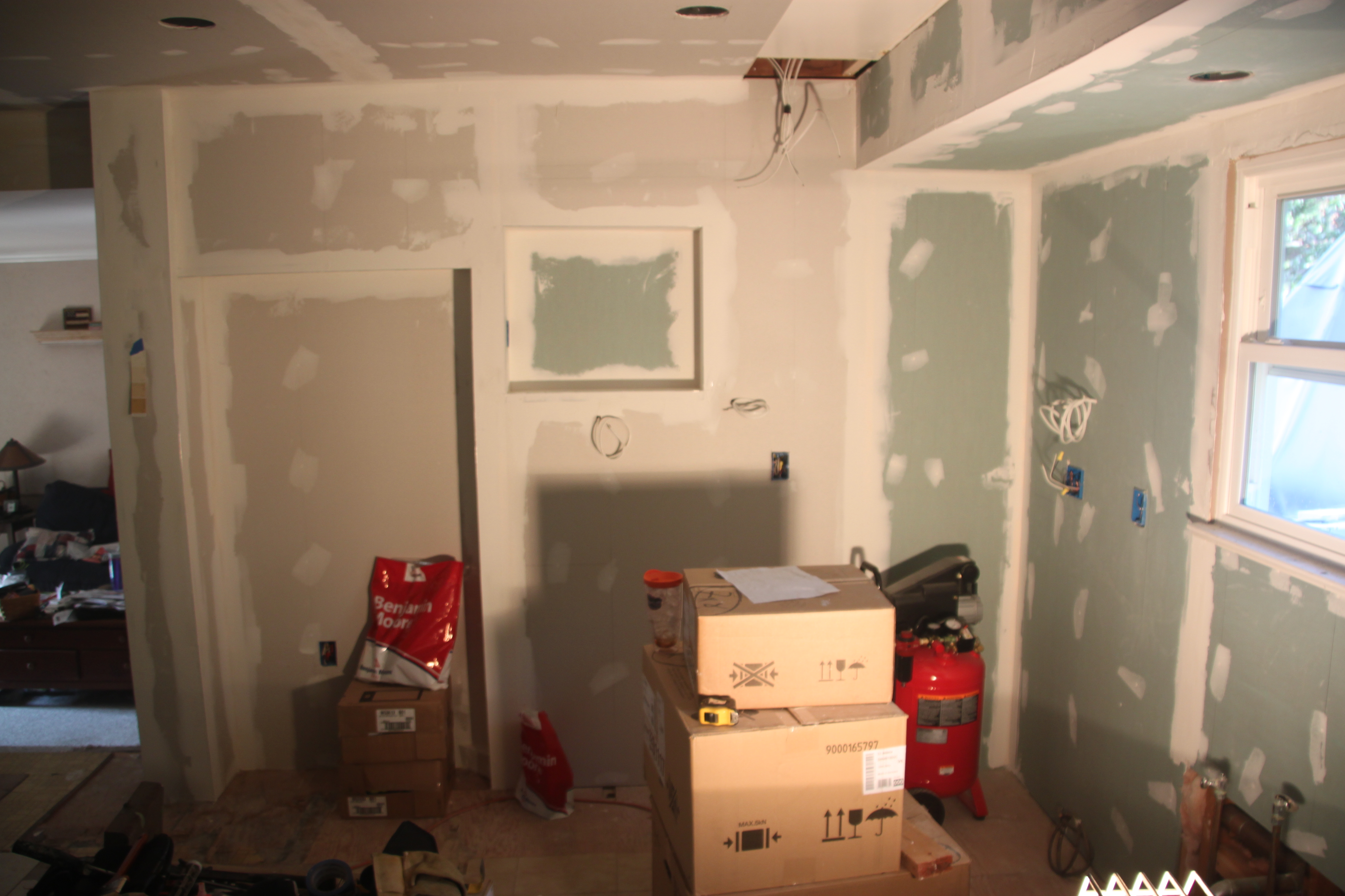 Sheetrock complete; "green board" is moisture and mold resistent (used on the outside walls).