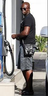 The equivalent of a woman's small handbag designed for use by men, having compartments for mobile phones etc. Messenger Bag Vs Man Purse 2buttonswag