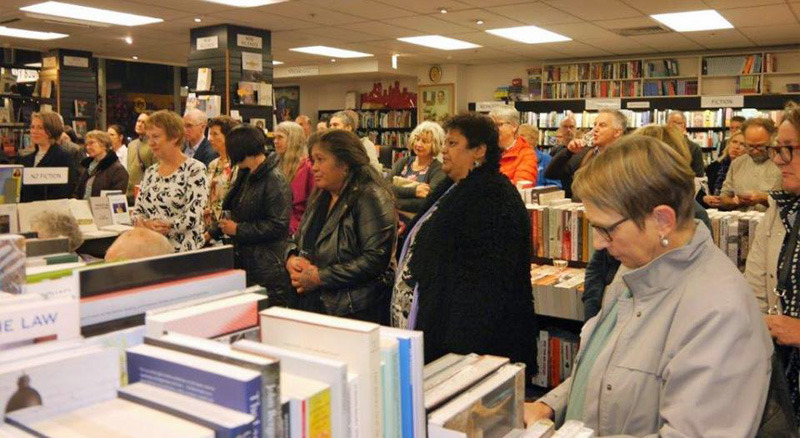 Tasi, Gloria and other guests listen to the speeches