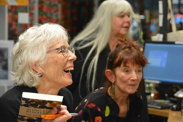 Pip signs books while Marion Castree and Jacqui Brokenshaw attend to the complete sell-out of books on the night.