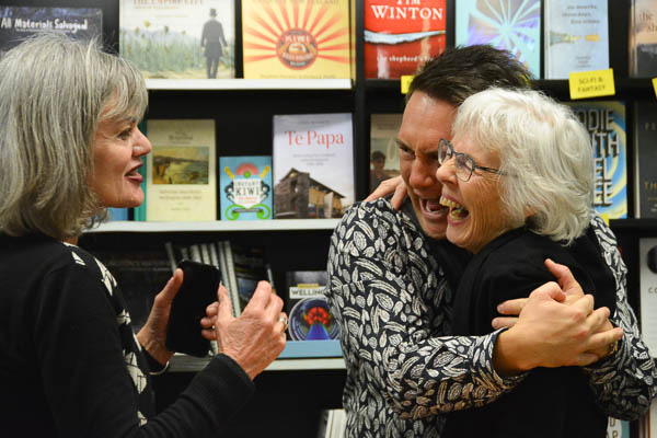 Nicola Legat looks on as Sean Rangiwhetu gives Pip a hug