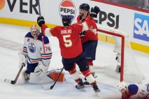 Stanley Cup Oilers Panthers Hockey Florida Panthers defenseman Aaron Ekblad (5) congratulates left wing Matthew Tkachuk (19) after Tkachuk scored a goal against Edmonton Oilers goaltender Stuart Skinner (74) during the second period of Game 5 of the NHL hockey Stanley Cup Finals, Tuesday, June 18, 2024, in Sunrise, FL. Courtesy: AP Photo/Rebecca Blackwell