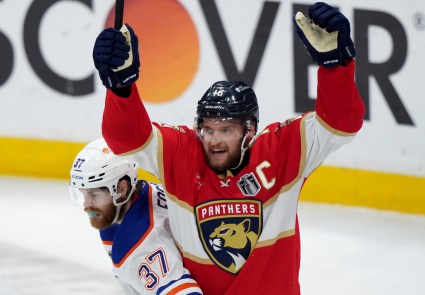 Stanley Cup Oilers Panthers Hockey Florida Panthers forward Aleksander Barkov (16) celebrates after his team's second goal as Edmonton Oilers forward Warren Foegele (37) reacts the during the second period of Game 7 of the NHL hockey Stanley Cup Final in Sunrise, FL, Monday, June 24, 2024. Courtesy: Nathan Denette/The Canadian Press via AP