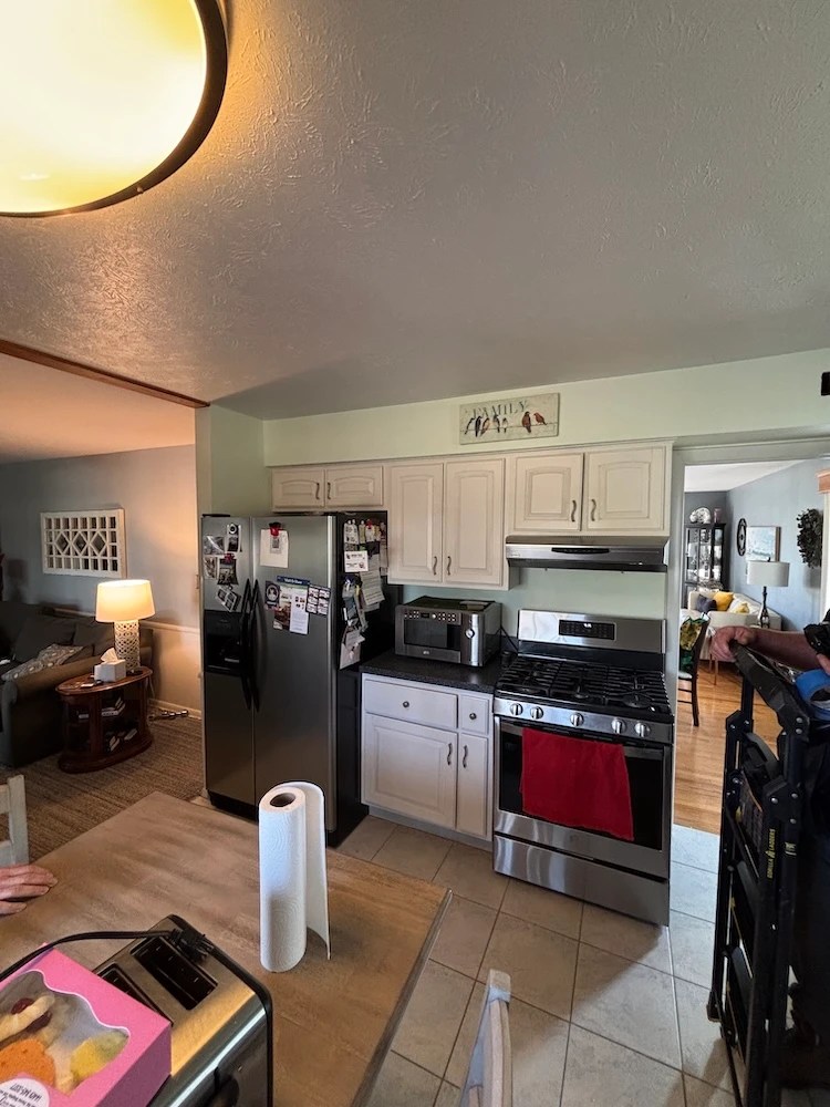 Gilbride kitchen remodel before: crowded space, outdated and mismatched cabinets and pulls