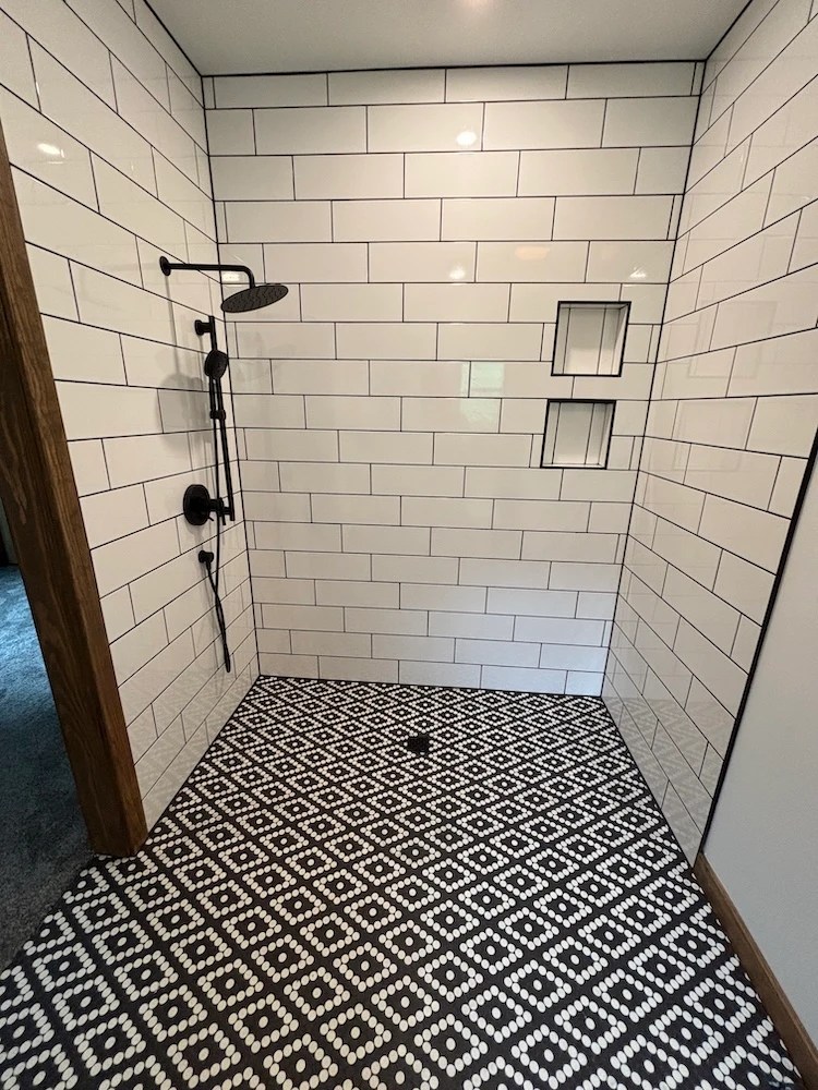 ADA accessible bathroom install: new penny tile floor / roll-in shower