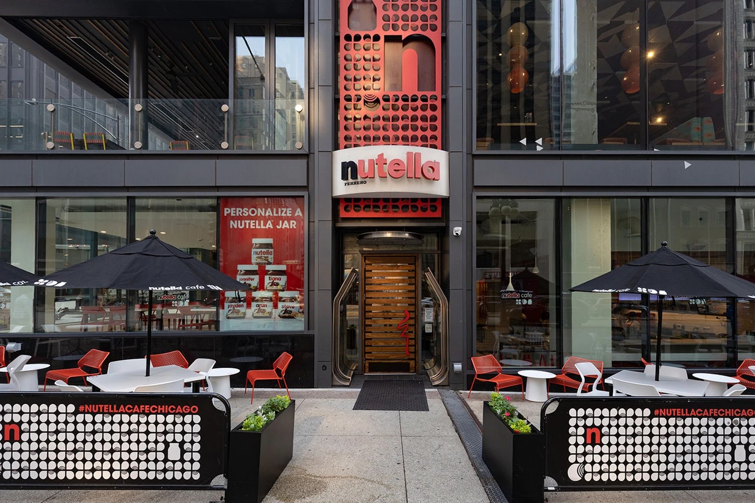 Exterior front view of the Nutella Cafe in Chicago featuring outdoor patio seating and branded signs