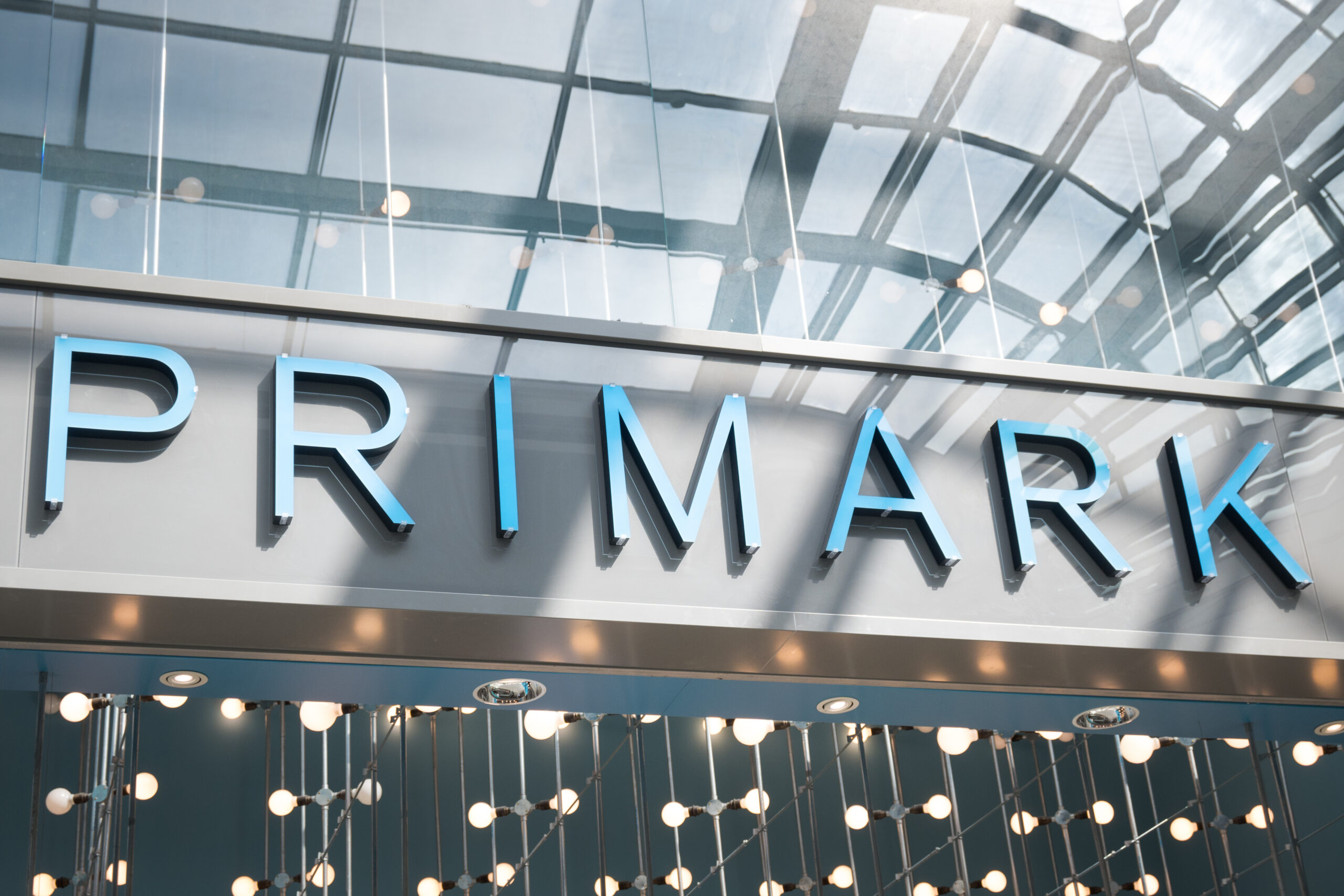 Storefront of Primark store with large branded signage