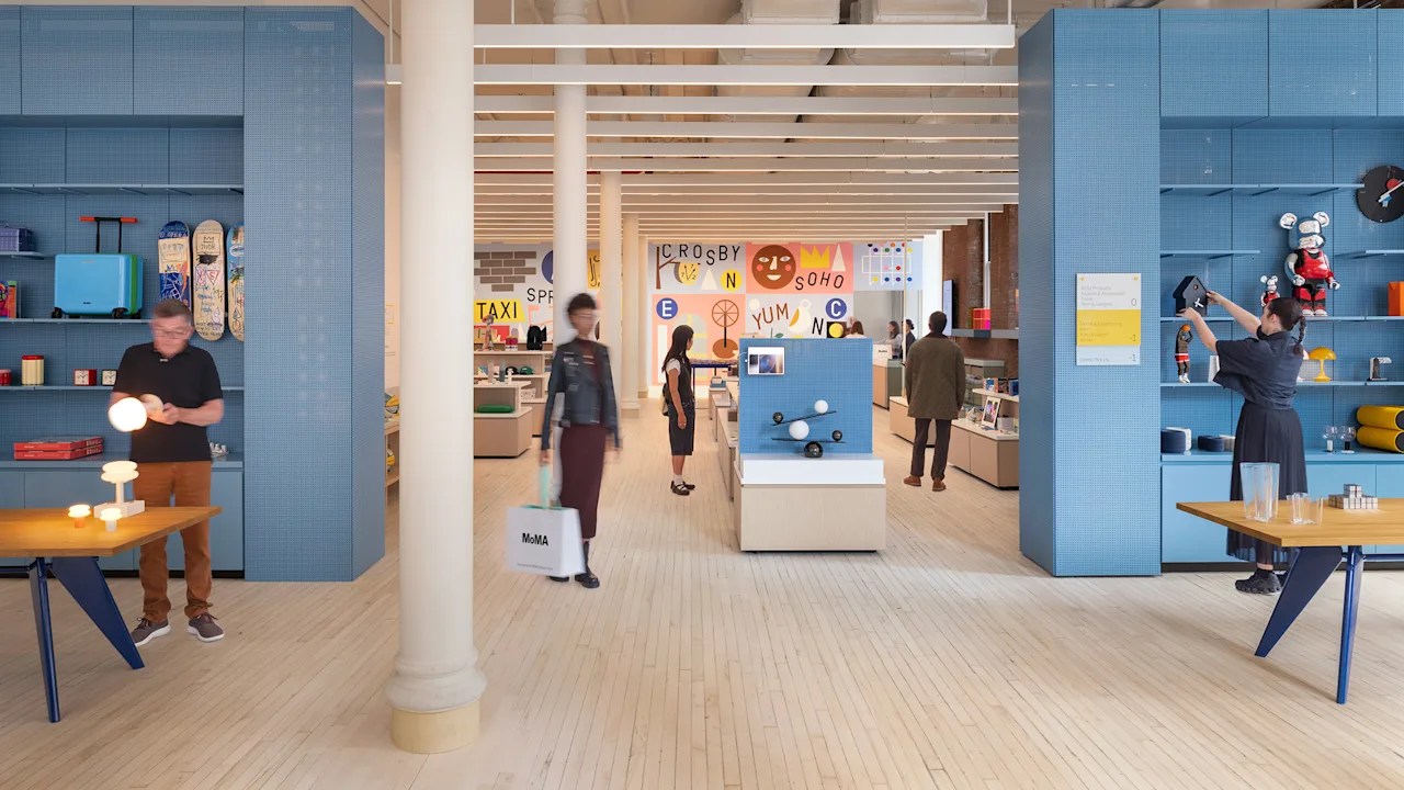 MoMA flagship store interior redesign featuring branded signage, display graphics, and clean modern retail layout
