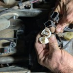 Disconnected temperature sensor connectors on Kubota SVL95-2 V3800