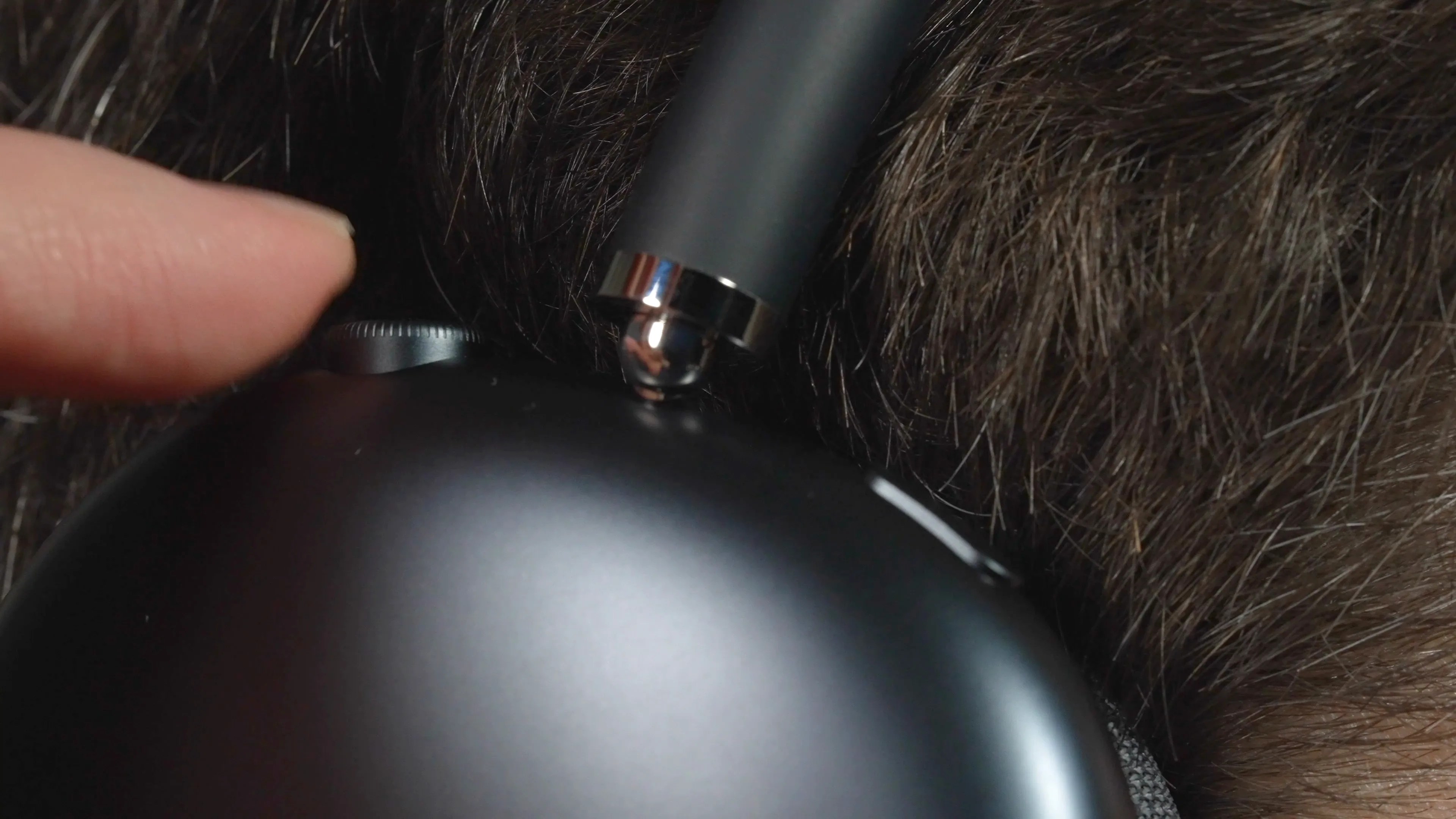 Digital Crown on the AirPods Max 2 ear cup used for volume and media control