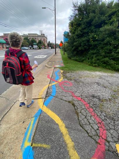 Western North Carolina native Mary Jo Padgett leads one of her history walks through downtown Hendersonville, July 2024