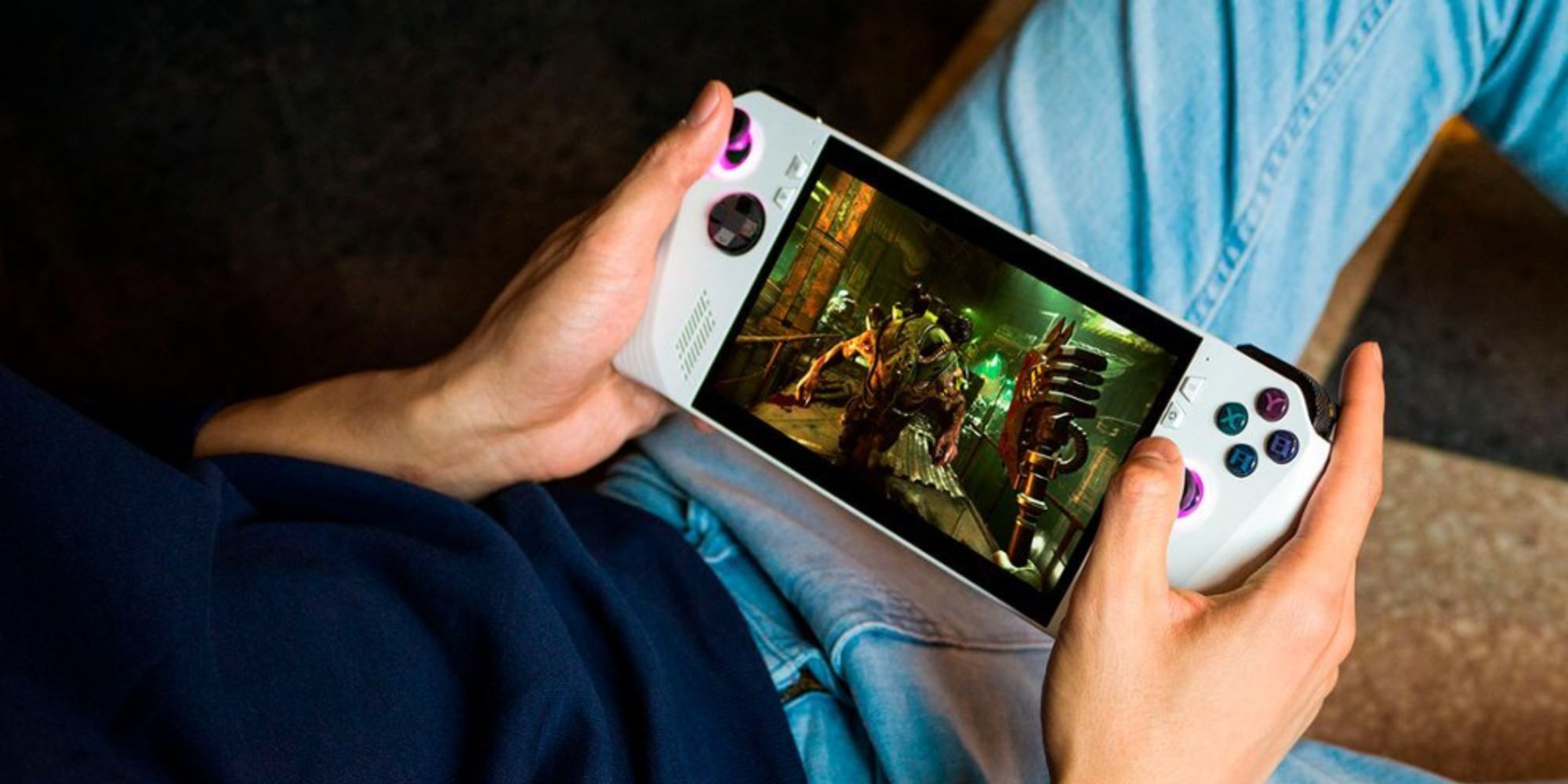 Image showing a person holding an ASUS ROG Ally gaming handheld.