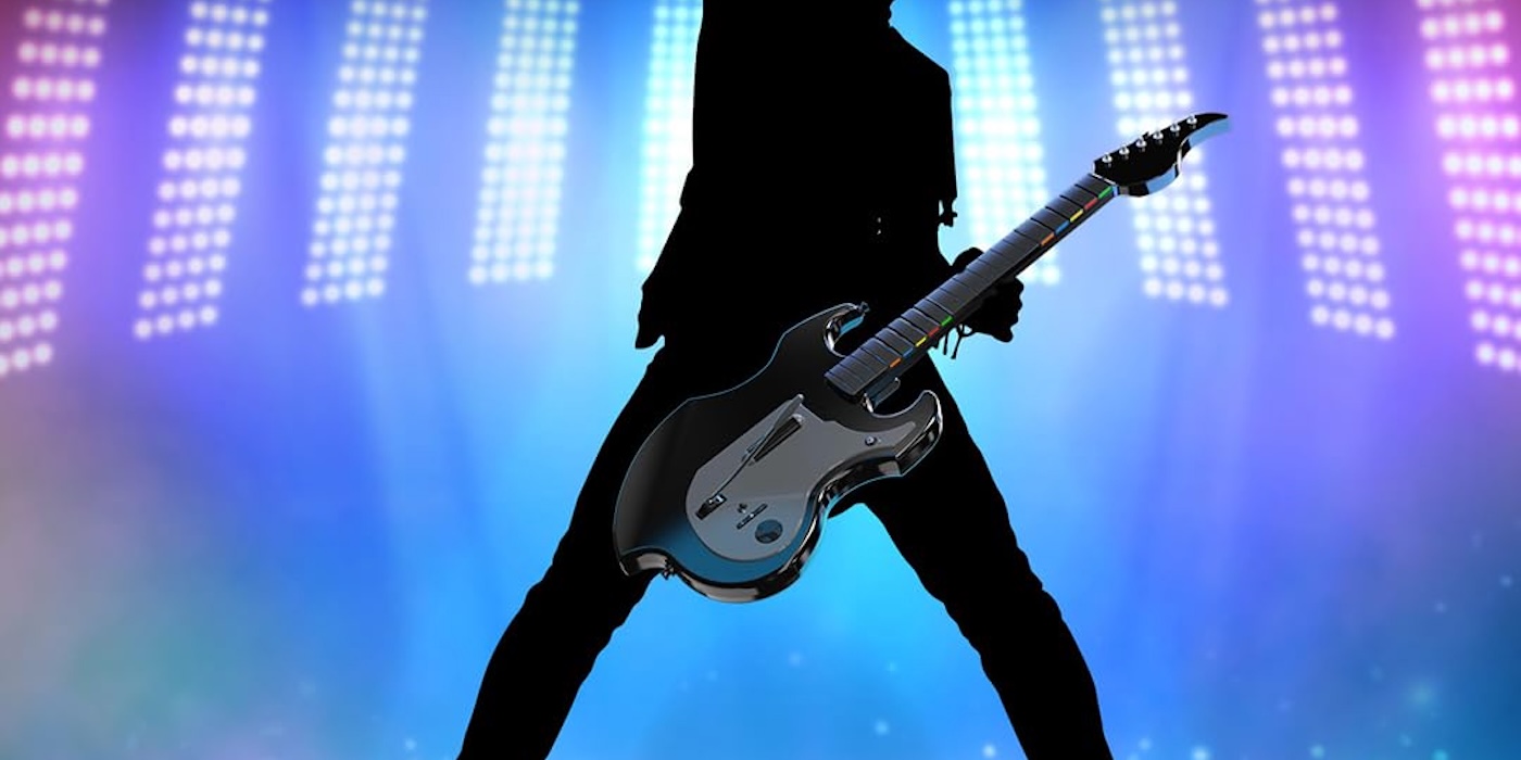 A person holding a guitar