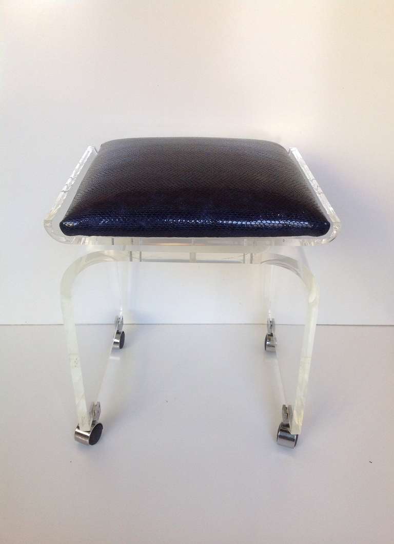 You may call +1 561 629 5153, Acrylic Swivel Top Vanity Stool Designed by Charles Hollis