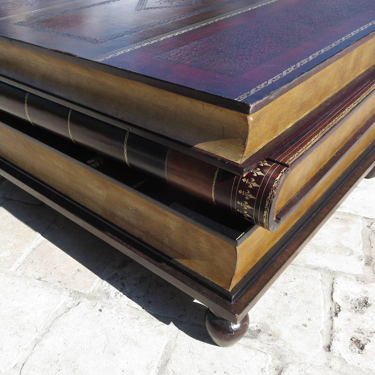 There is some science to creating a stunning tablescape, such as using objects in varying heights, but the magic mainly comes from an artful mix of flowers , books, trays, and. Leather Stacked Books Coffee Table by Maitland-Smith at ...