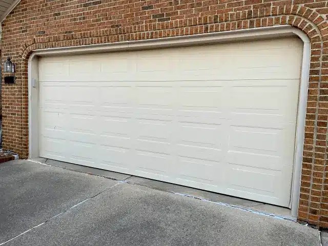 Fix garage doors that jerk when opening & closing