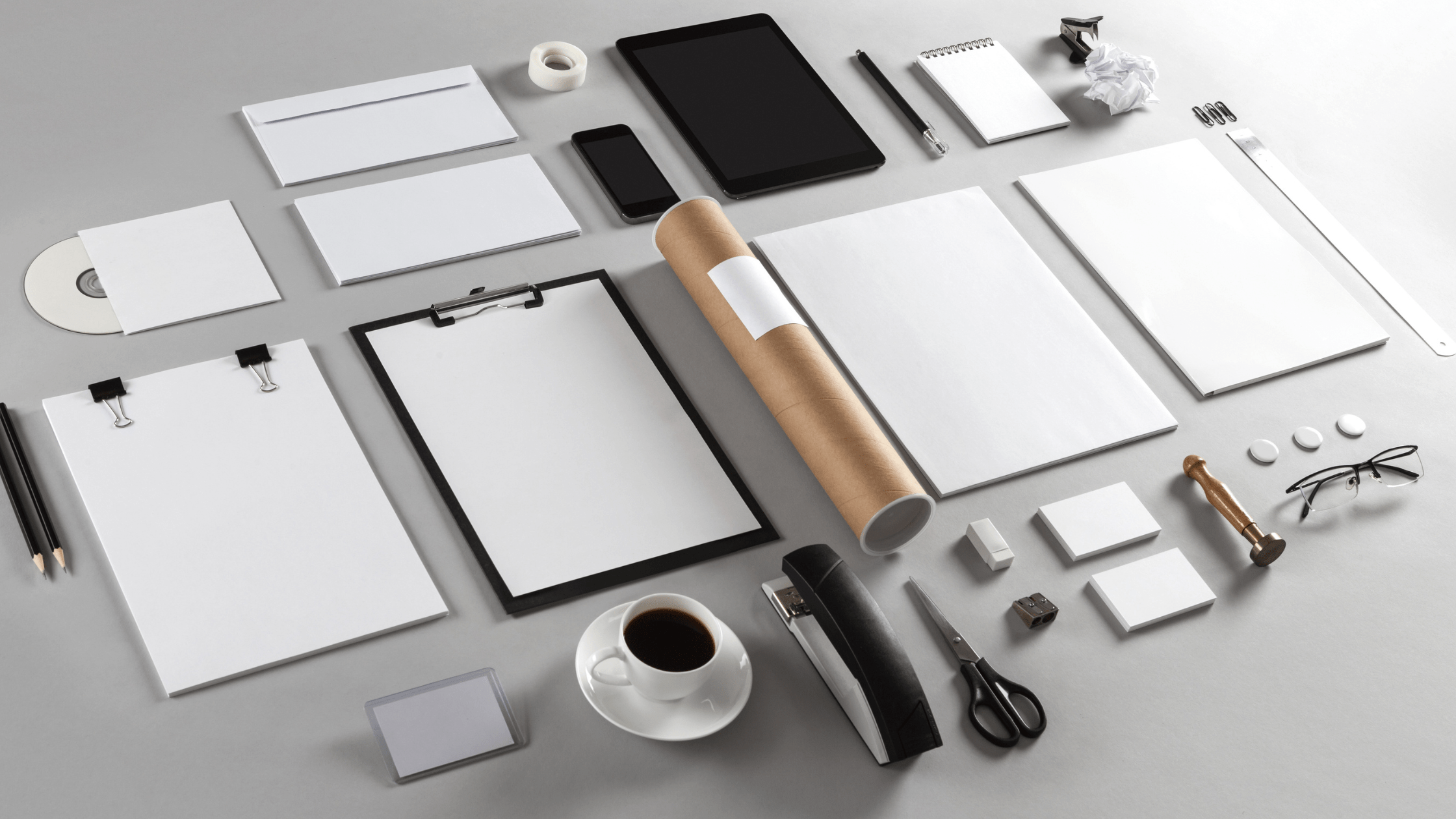 Brand Identity Design Service depicted by a branding identity template of papers, cards etc