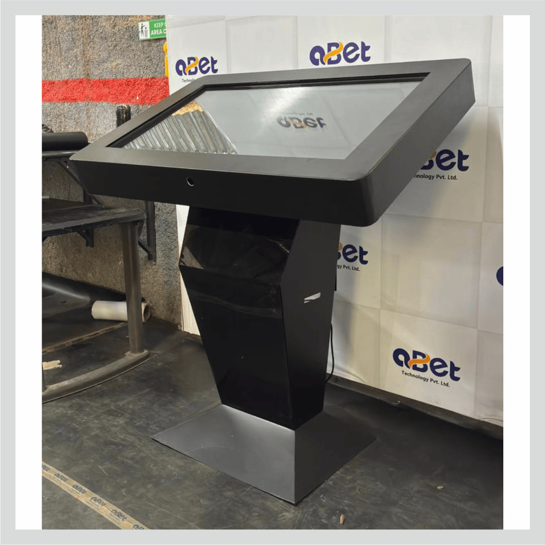 Black welcome kiosk with interactive touchscreen display for visitor information and self-service