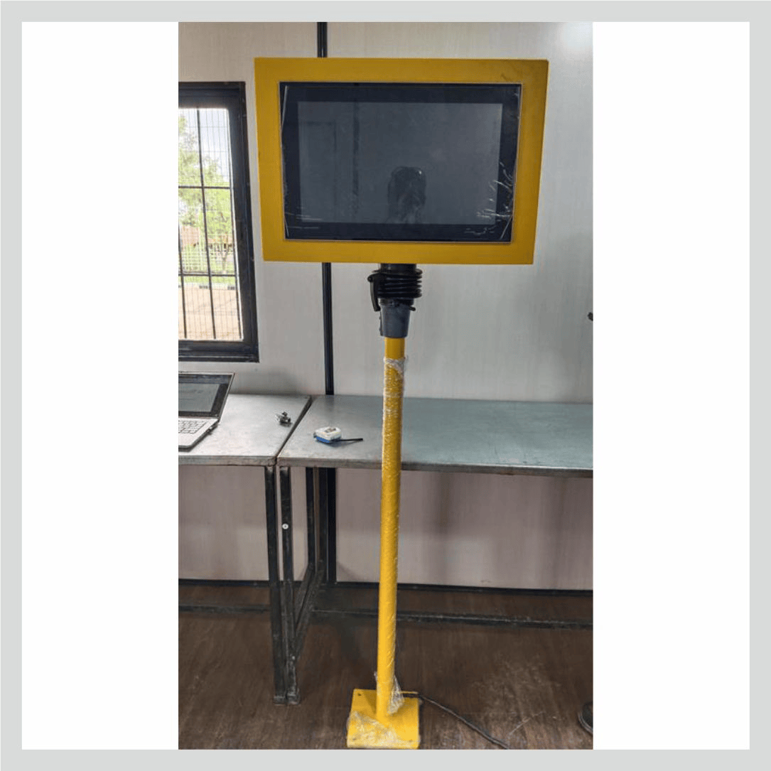 Industrial kiosk with touchscreen display for factory operations and digital information