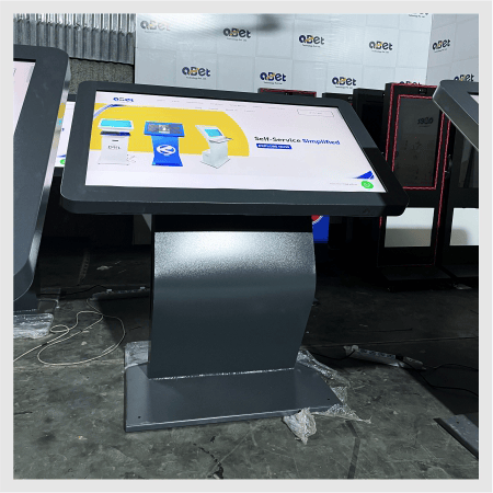 Welcome kiosk with interactive touchscreen display for visitor information and self-service
