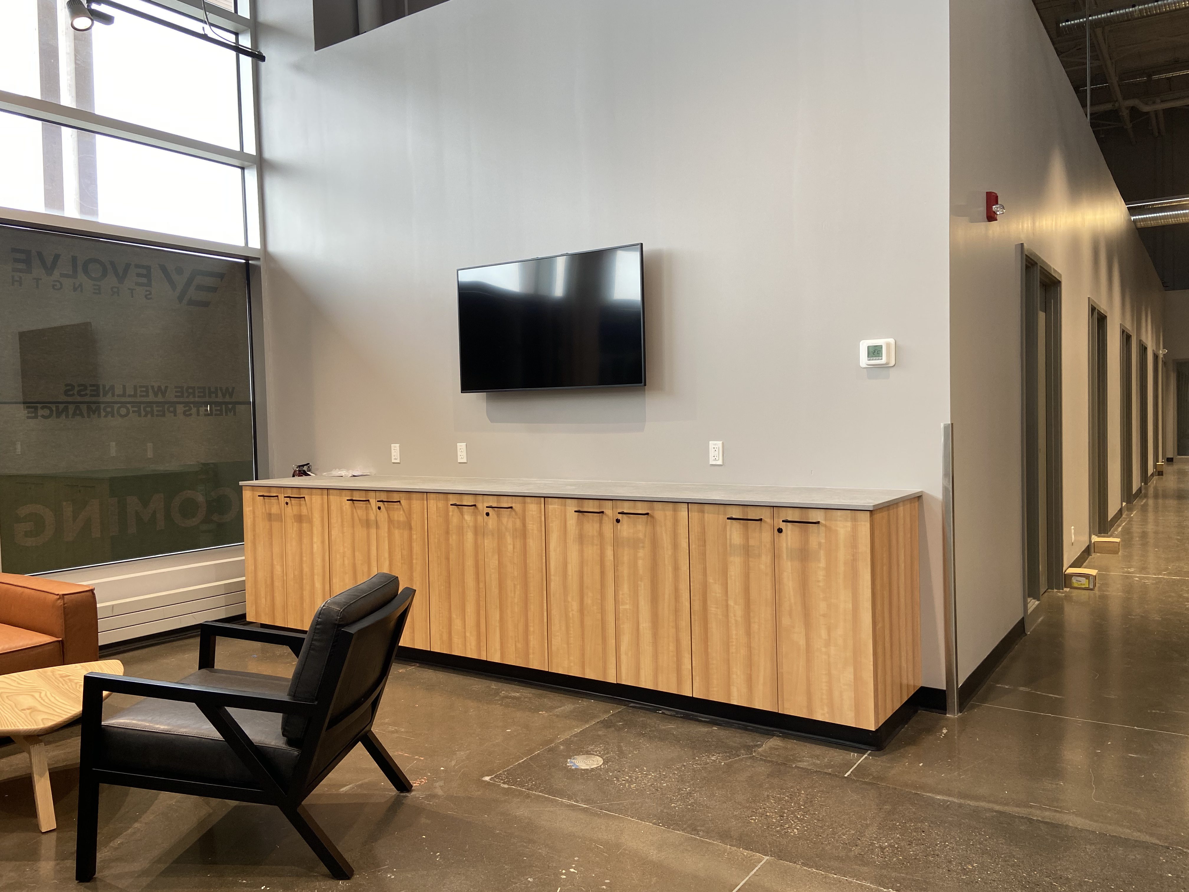 Integrated retail display millwork at Evolve Strength Seton