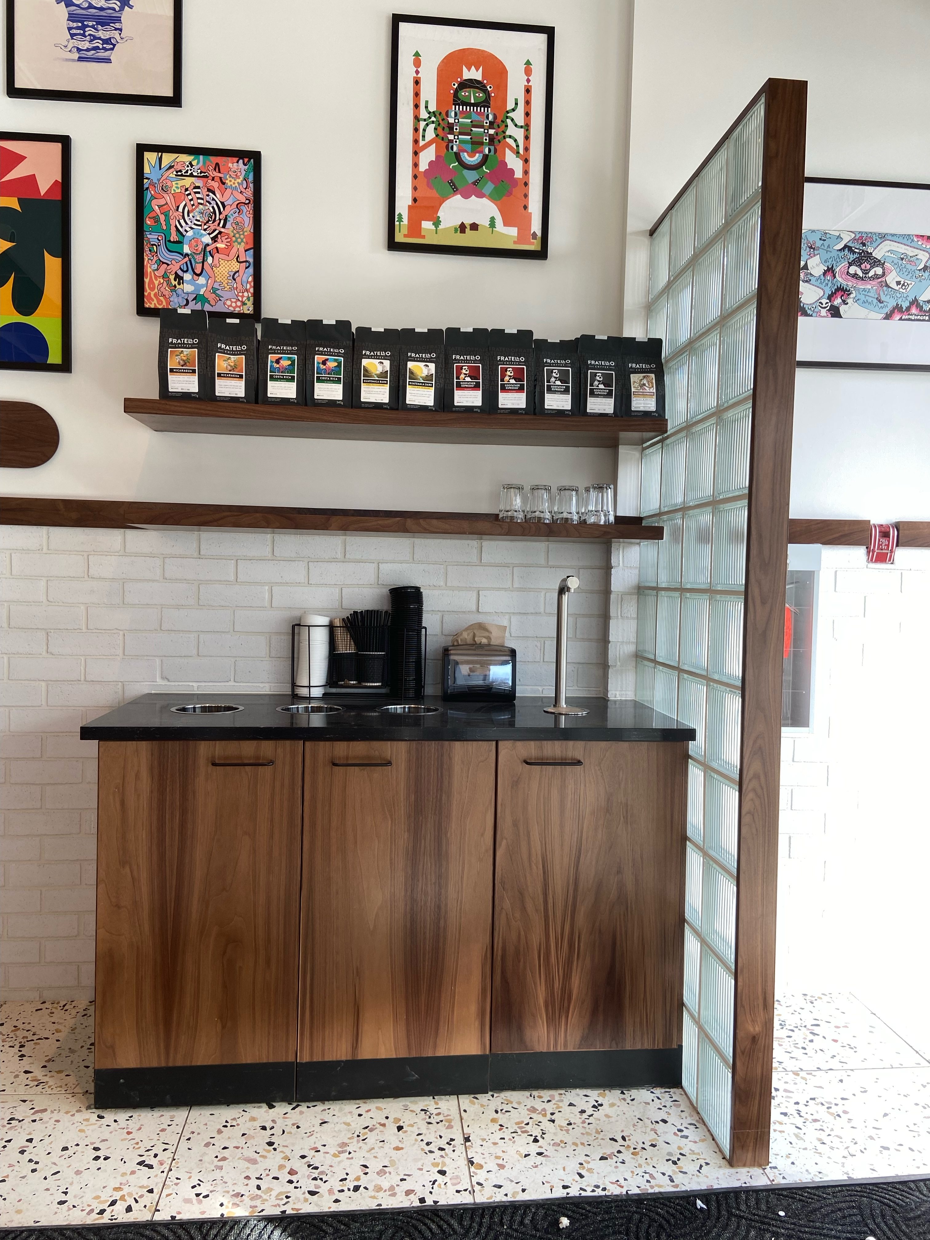 Banquette and wall millwork details at Pact Coffee Edmonton