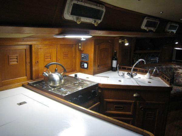 The galley with double sinks, Force 10 stove, top loading freezer and frong opening fridge