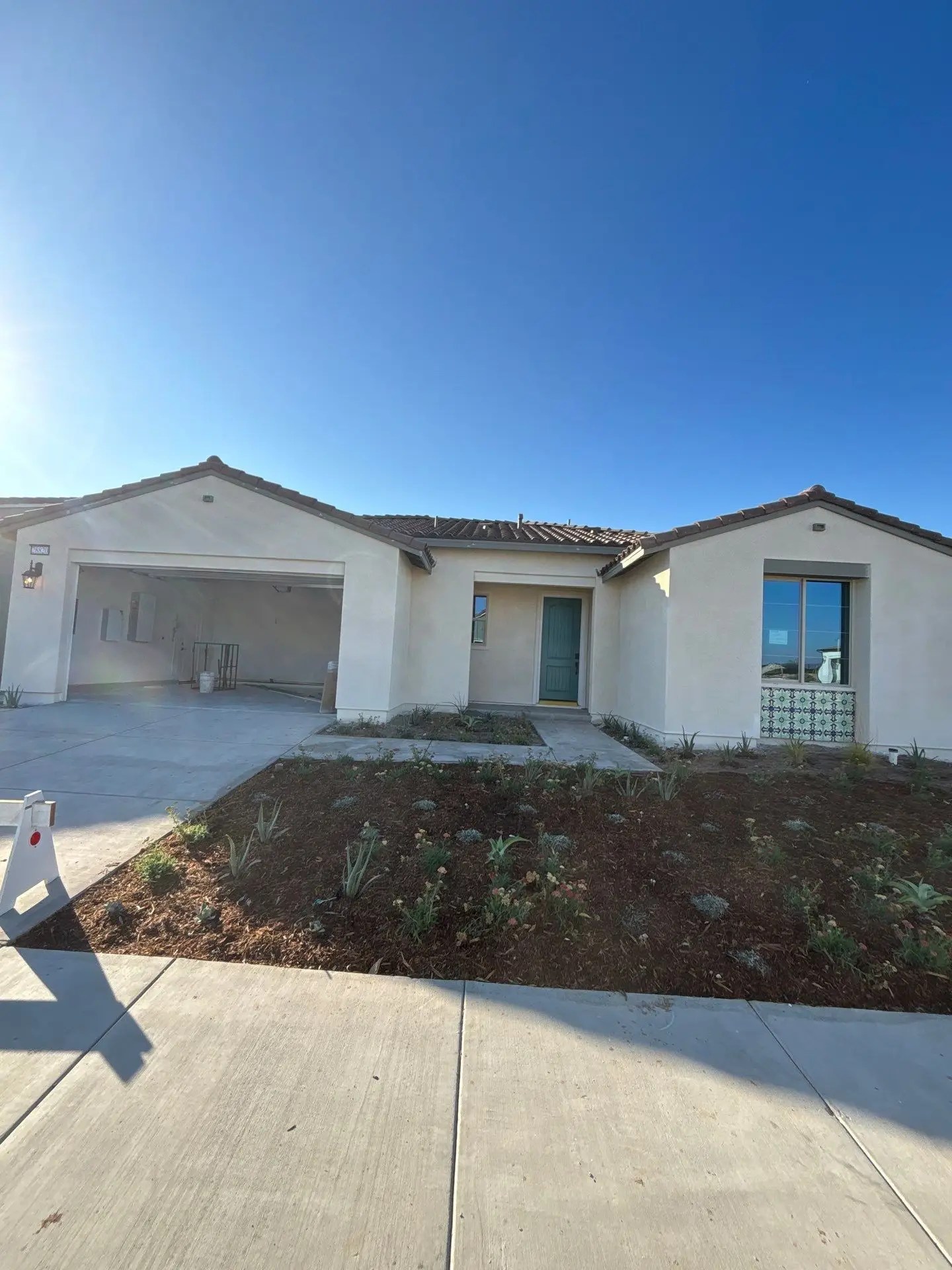 Exterior of photo Atlis single family home in Santa Clarita, CA. Services provide were ECC/HERS verifications and tests.
