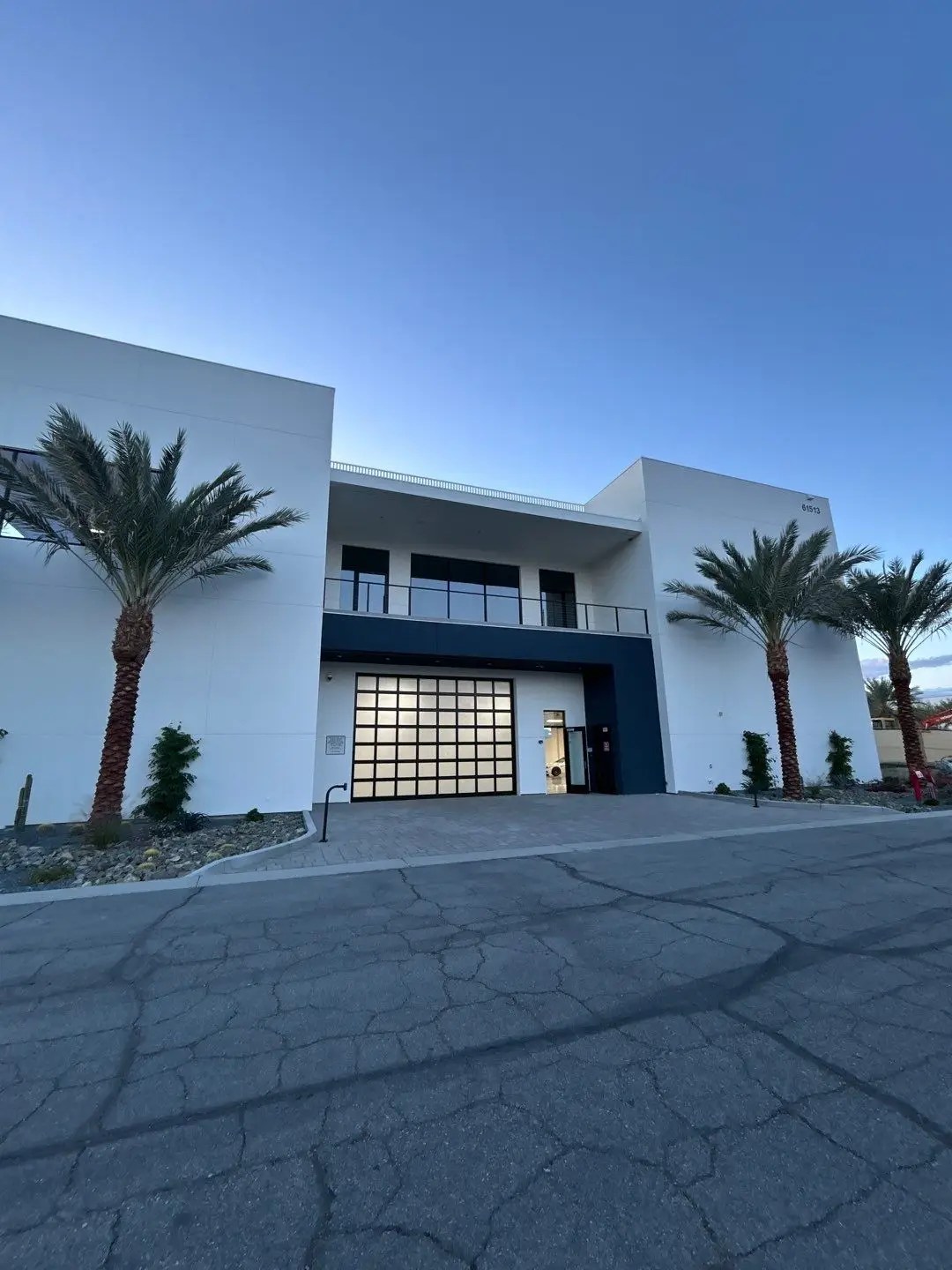 Exterior photo of the Thermal Club in Thermal, CA, a racetrack, luxury experience business in Southern California. Services provided here include Air Balancing (TAB), Mechanical Acceptance Testing (MATT), and Lighting Controls Acceptance Testing (LCATT).