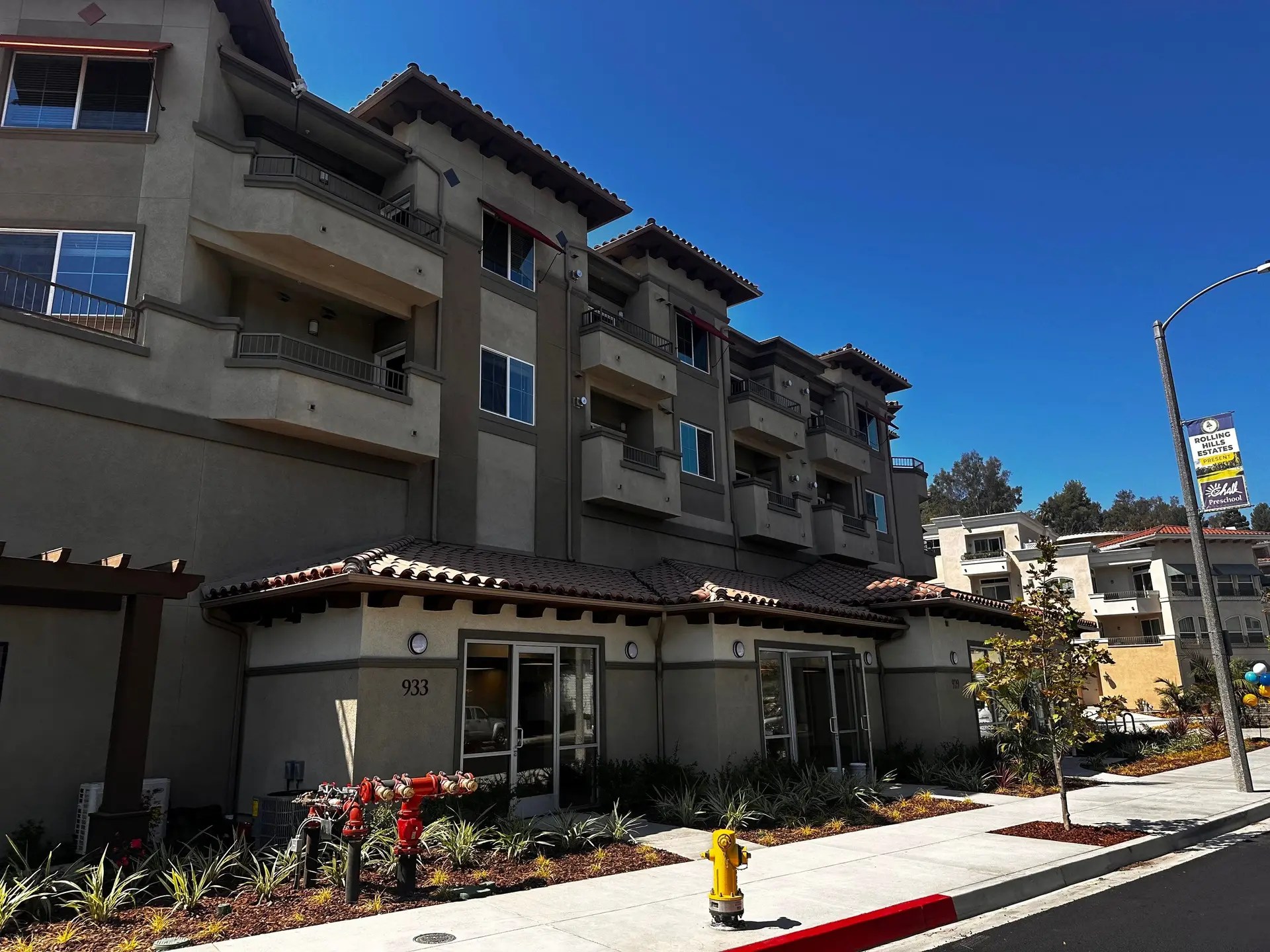 Exterior photo of La Sevilla, a multifamily condominium complex in Deep Valley, Rolling Hills Estates, CA. Services provided here include LEED certification and ECC/HERS verifications.