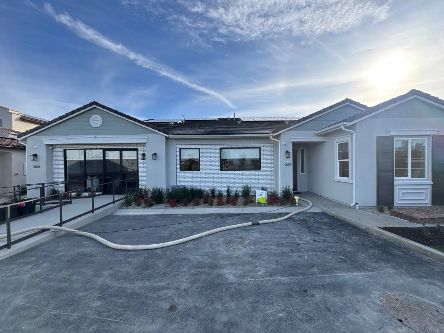 Front facing photo of a single family home at the Lavender by Tri Pointe Homes in Rancho Mission Viejo, CA. Services provided here include ECC/HERS verifications and tests.