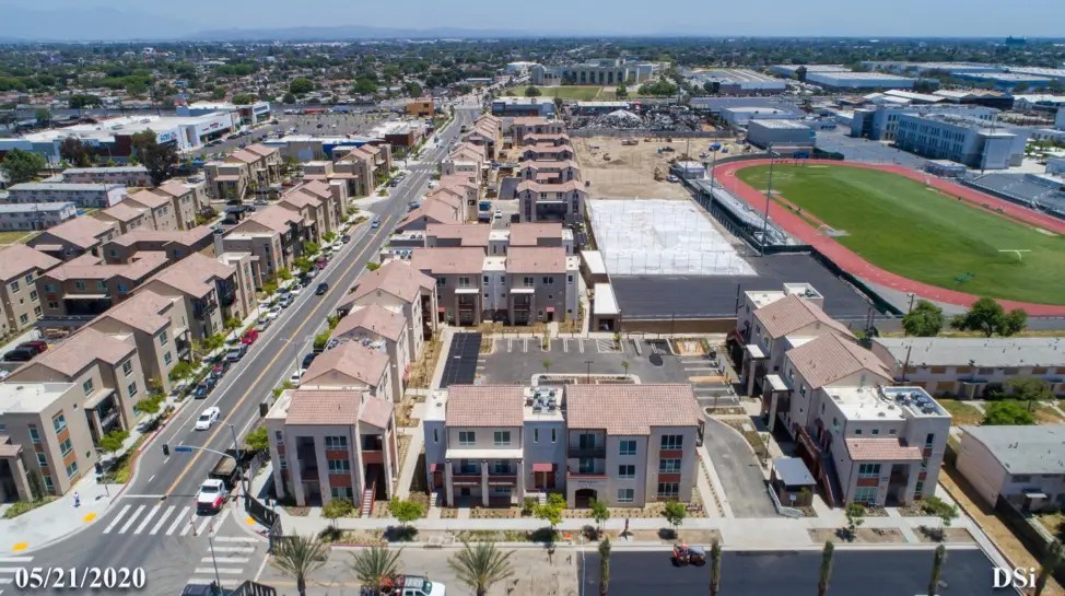 Aerial view of the Jordan Downs redevelopment in Watts, Los Angeles, CA. Services provided here include ECC (HERS) verifications and tests for LEED Gold certification, Air Balancing, and mechanical and lighting controls acceptance testing.
