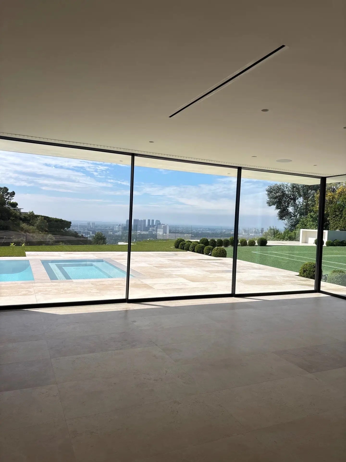 Landscape photo from a single family home overlooking downtown Los Angeles, a city in Southern California. ECC/HERS verifications and testing was conducted at this single family.