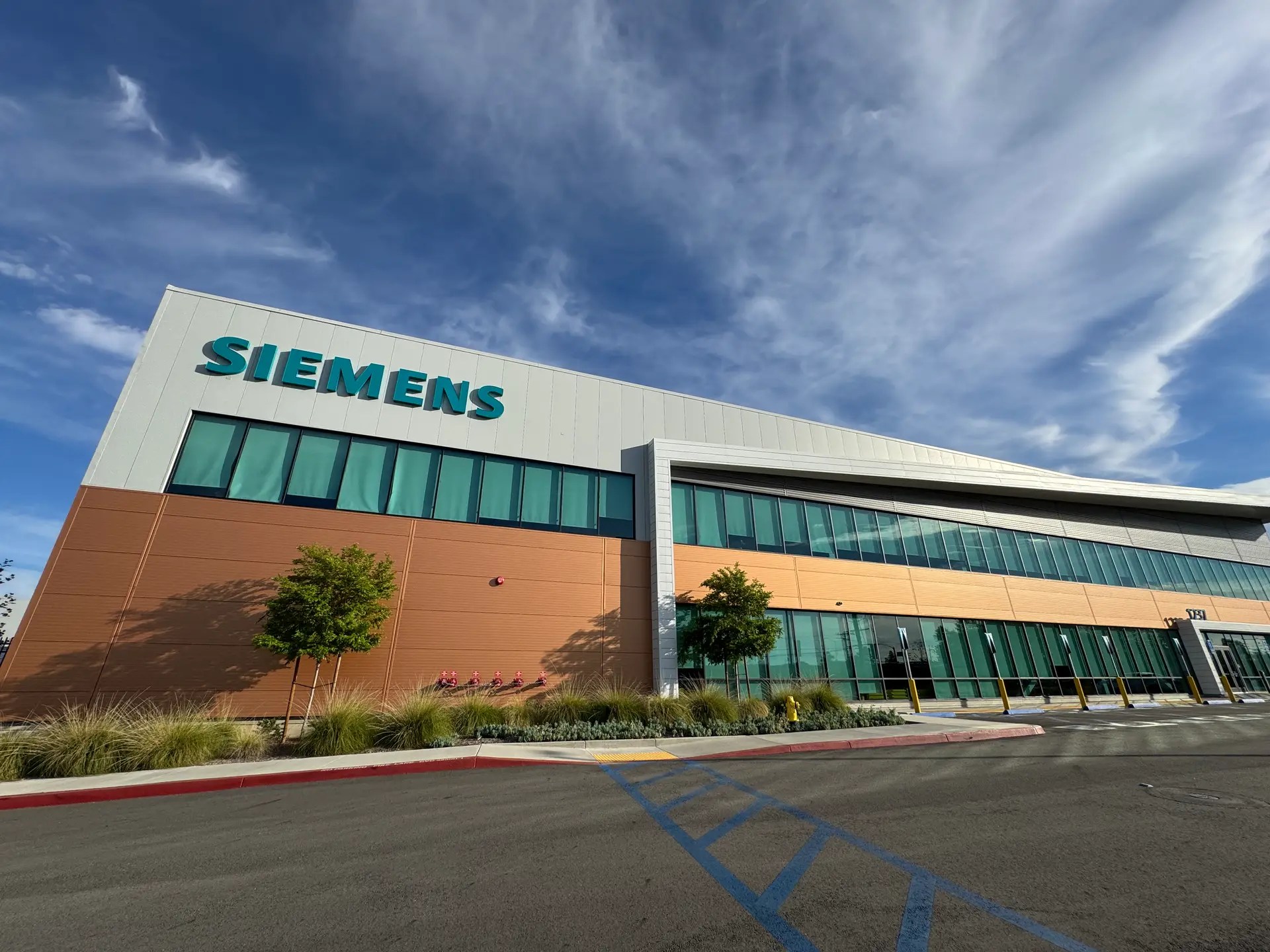 Exterior photo of the Siemens facility. Services performed here include a whole-building or large compartmentalization test, also known as a blower door test.