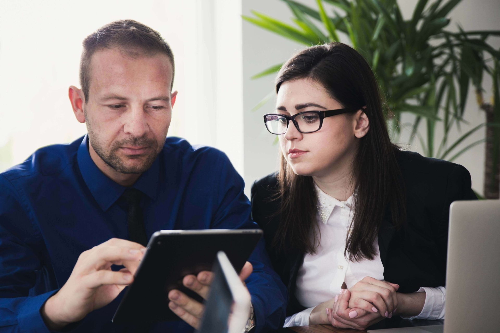 CTO and HR leader reviewing nearshore SaaS development options for their engineering team